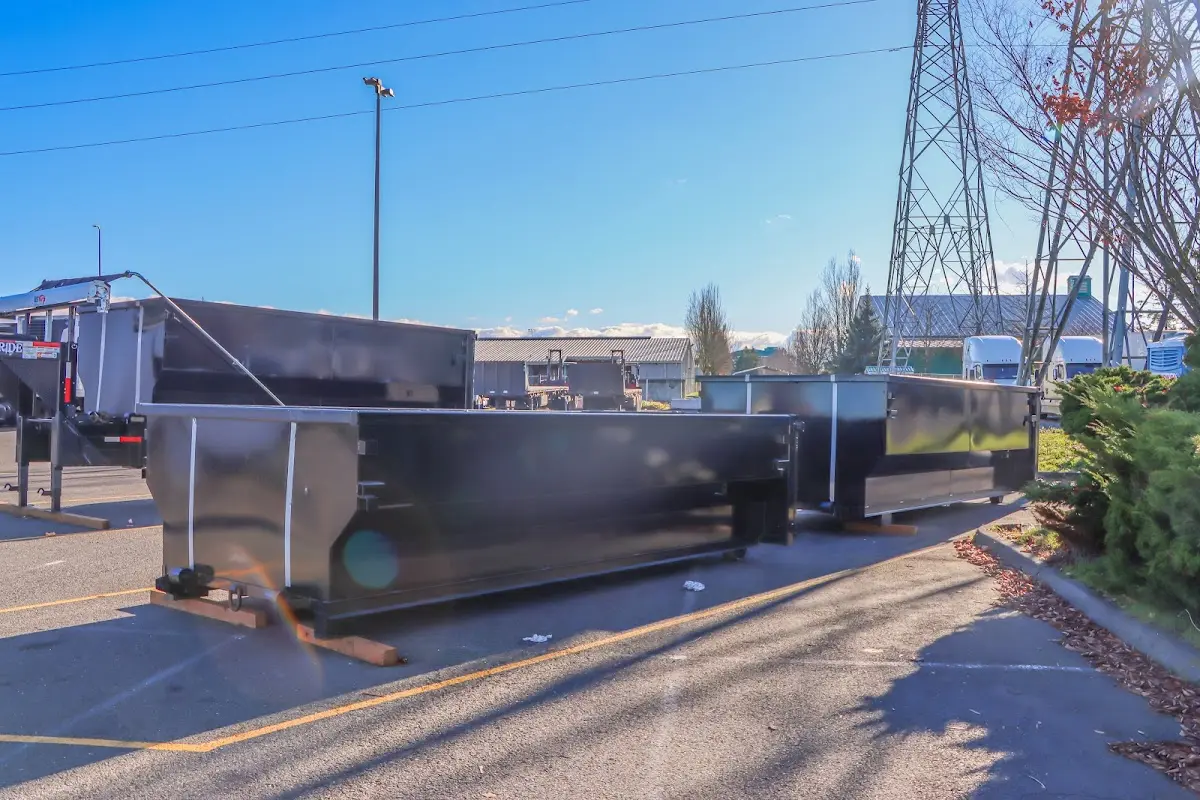 Roll-off dumpster ready for waste disposal at job site for Construction Dumpster Rental in Burke Centre